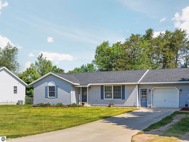 1708 Ketha Dr, Cadillac, MI 49601 - single story home featuring a garage, driveway, a front yard, and a shingled roof