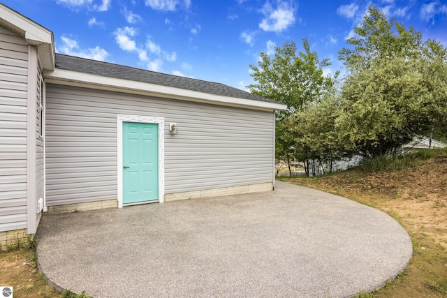 3874 Falling Leaf Trl, Traverse City, MI 49686 - entrance to property featuring a patio