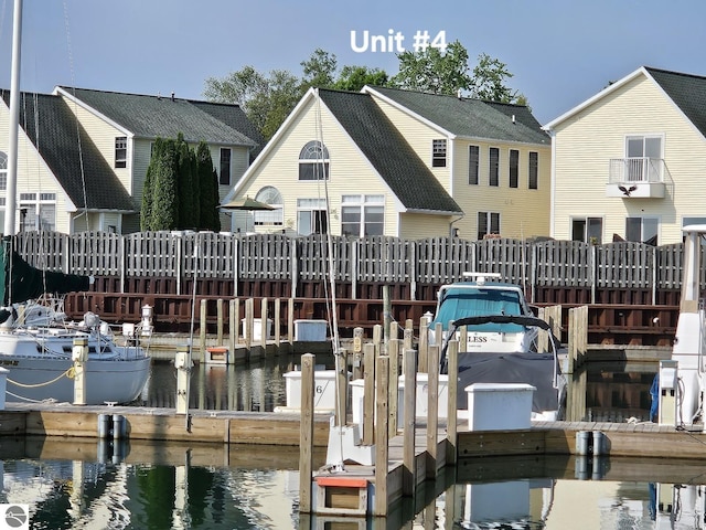 1005 W Lake St Unit 4, Tawas City, MI 48763 - dock area featuring a water view