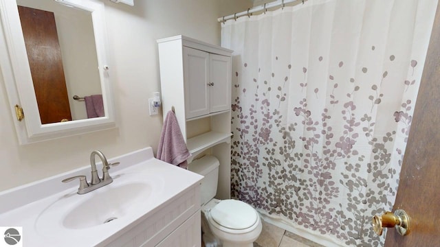 7500 Five Lakes Dr, Farwell, MI 48622 - bathroom with vanity, curtained shower, and tile patterned flooring