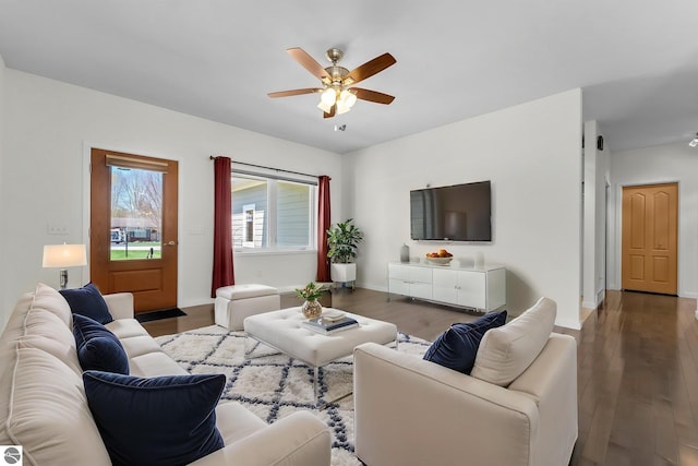 301 Pearl St, Kingsley, MI 49649 - living area featuring a ceiling fan and wood finished floors
