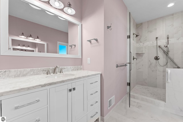 301 Pearl St, Kingsley, MI 49649 - full bathroom featuring marble finish floors, a marble finish shower, vanity, and recessed lighting