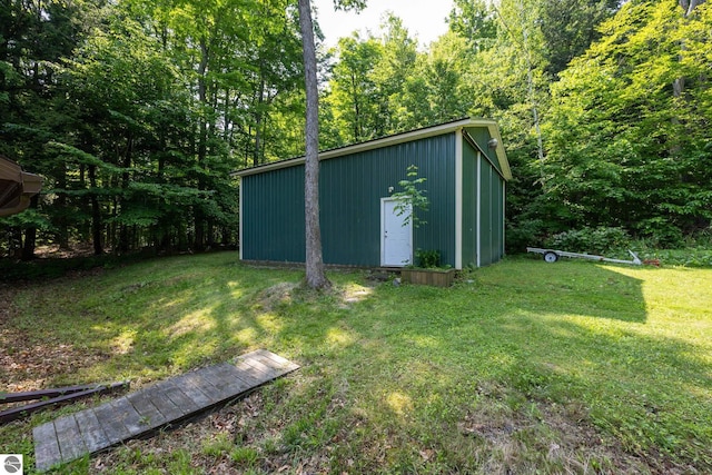 16530 Lonesome Trl, Leroy, MI 49655 - view of outbuilding featuring a view of trees