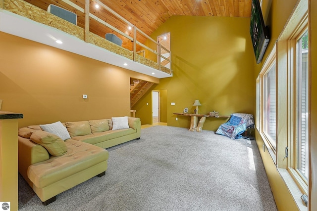1849 W 24th Rd, Boon, MI 49618 - living area featuring wooden ceiling, carpet flooring, high vaulted ceiling, stairs, and recessed lighting