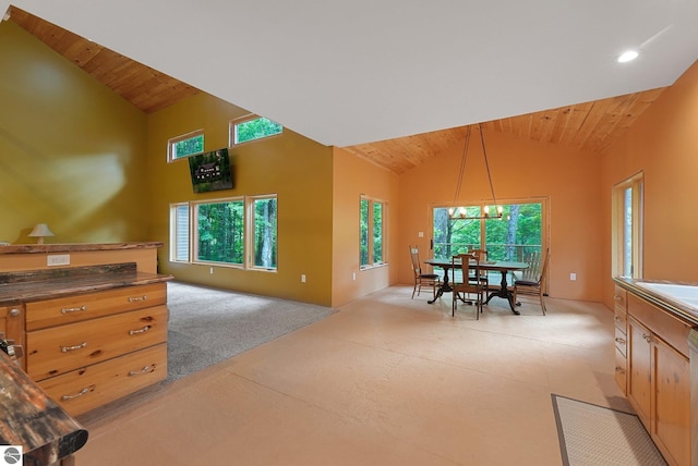 1849 W 24th Rd, Boon, MI 49618 - dining area with wood ceiling, high vaulted ceiling, and a chandelier