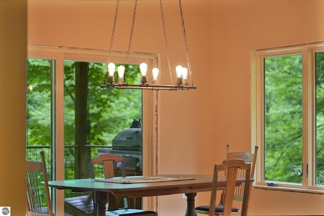 1849 W 24th Rd, Boon, MI 49618 - dining space with a chandelier