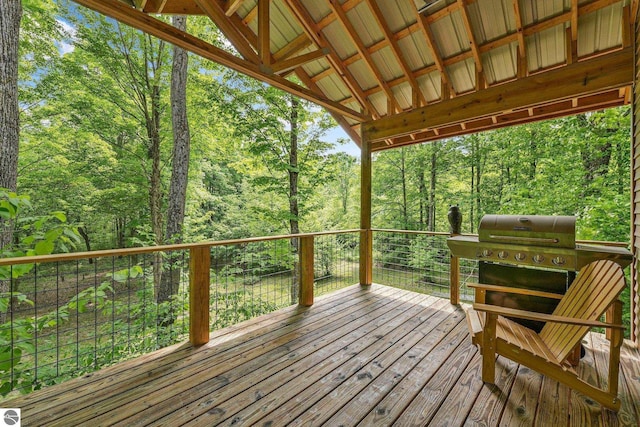 1849 W 24th Rd, Boon, MI 49618 - wooden deck with a grill and a view of trees
