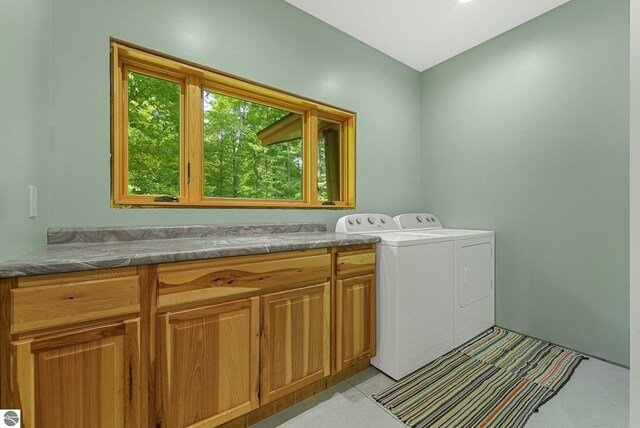 1849 W 24th Rd, Boon, MI 49618 - laundry area with separate washer and dryer and cabinet space