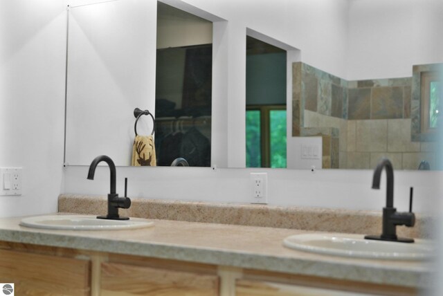 1849 W 24th Rd, Boon, MI 49618 - bathroom featuring double vanity
