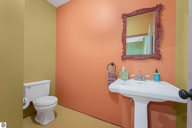1849 W 24th Rd, Boon, MI 49618 - half bathroom with toilet and tile patterned floors