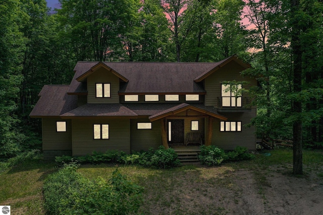 1849 W 24th Rd, Boon, MI 49618 - view of front of home featuring covered porch and roof with shingles