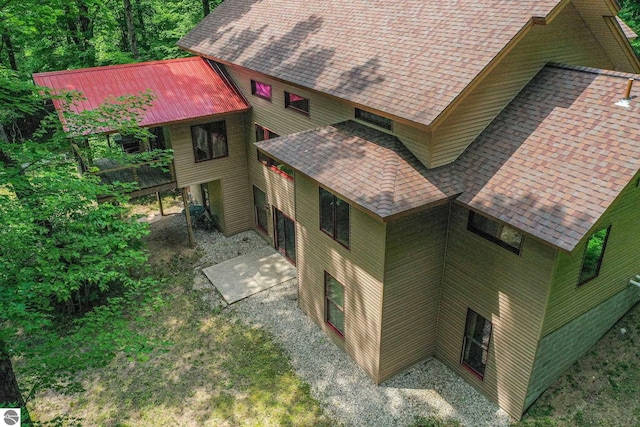 1849 W 24th Rd, Boon, MI 49618 - view of property exterior featuring a shingled roof