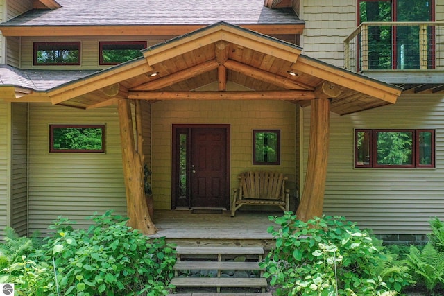 1849 W 24th Rd, Boon, MI 49618 - doorway to property featuring a shingled roof