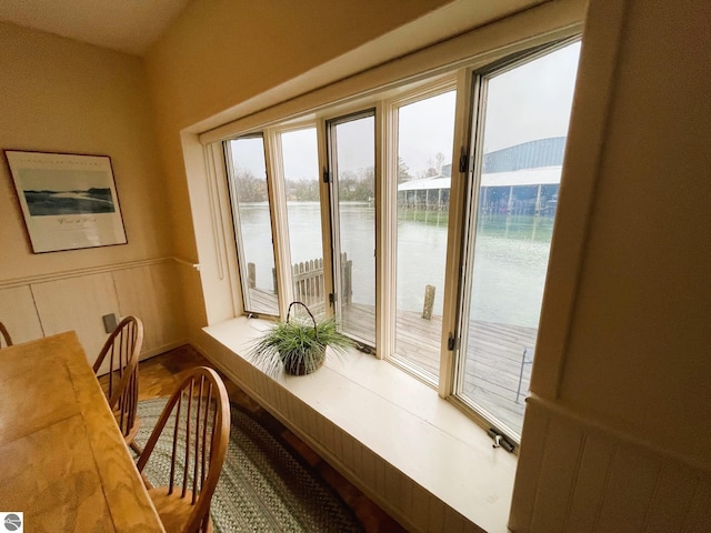 407 S Main St, Leland, MI 49654 - sunroom / solarium featuring a water view