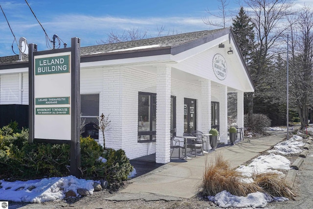407 S Main St, Leland, MI 49654 - view of snow covered building