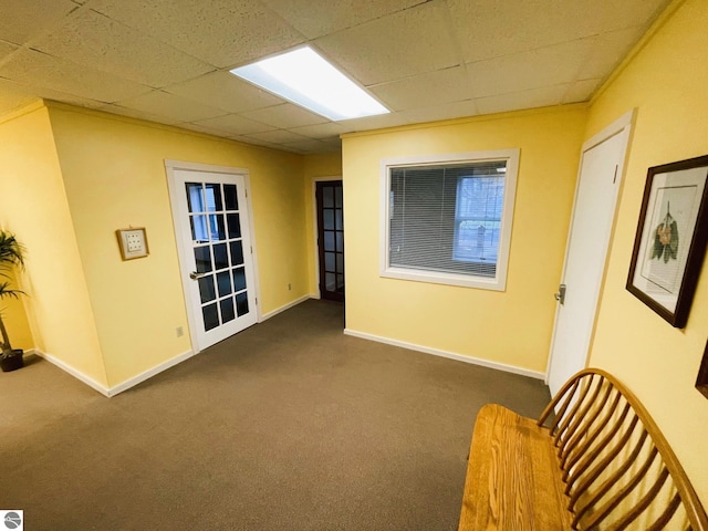407 S Main St, Leland, MI 49654 - hall with dark colored carpet and a drop ceiling