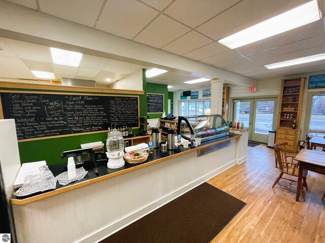 407 S Main St, Leland, MI 49654 - office with a paneled ceiling and wood finished floors