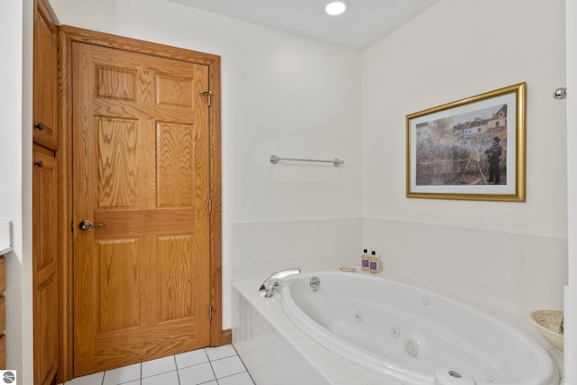 6352 S Westwood Pkwy, Suttons Bay, MI 49682 - full bathroom featuring a jetted tub and tile patterned floors