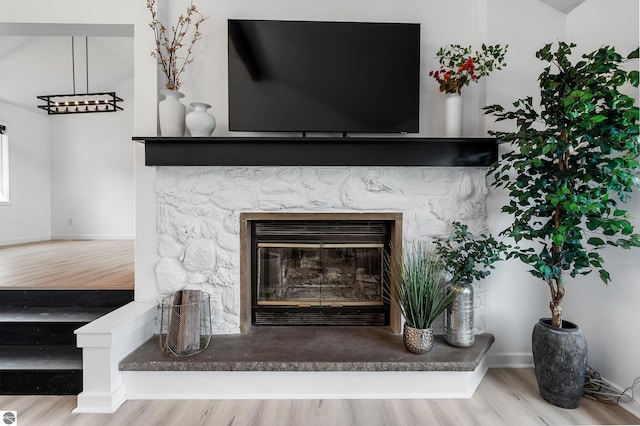 1259 Lin Dale Dr, Traverse City, MI 49686 - detailed view of wood finished floors and a fireplace