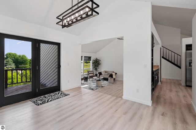 1259 Lin Dale Dr, Traverse City, MI 49686 - foyer with light wood-style floors and high vaulted ceiling