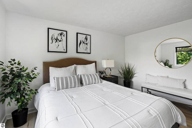 1259 Lin Dale Dr, Traverse City, MI 49686 - bedroom featuring wood finished floors