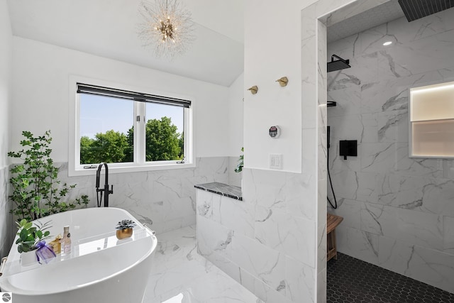 1259 Lin Dale Dr, Traverse City, MI 49686 - full bath featuring tile walls, a marble finish shower, a freestanding tub, marble finish flooring, and a wainscoted wall