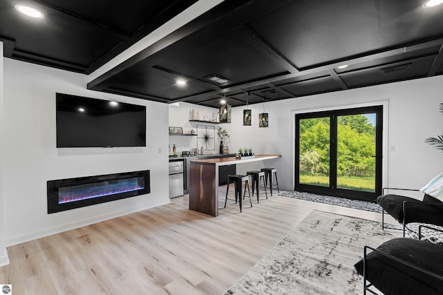 1259 Lin Dale Dr, Traverse City, MI 49686 - indoor wet bar featuring light wood-style floors, coffered ceiling, a glass covered fireplace, and recessed lighting