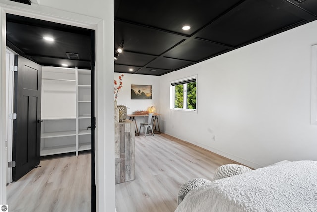 1259 Lin Dale Dr, Traverse City, MI 49686 - bedroom with light wood finished floors, recessed lighting, coffered ceiling, a closet, and a spacious closet