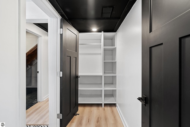 1259 Lin Dale Dr, Traverse City, MI 49686 - spacious closet featuring light wood-style flooring