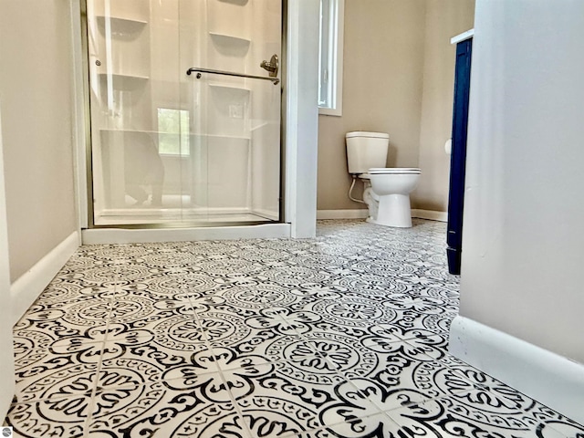 7160 Cherry Ave, Kewadin, MI 49648 - bathroom with a stall shower and toilet