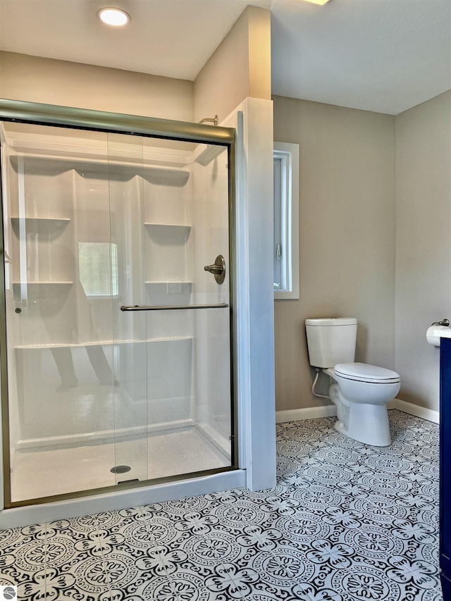 7160 Cherry Ave, Kewadin, MI 49648 - bathroom featuring a shower stall, recessed lighting, and tile patterned floors