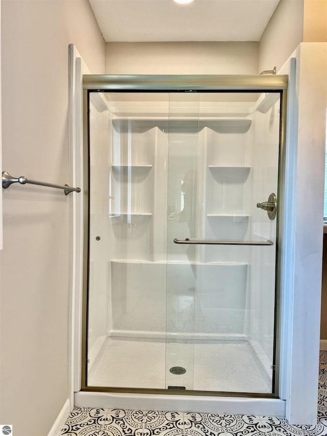 7160 Cherry Ave, Kewadin, MI 49648 - bathroom featuring a shower stall