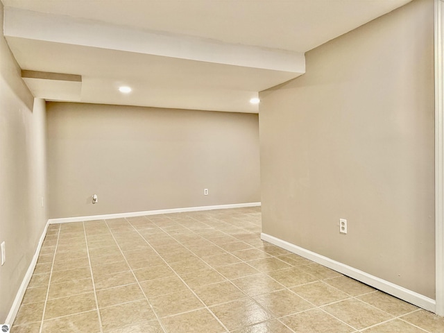 7160 Cherry Ave, Kewadin, MI 49648 - finished below grade area featuring recessed lighting and light tile patterned floors