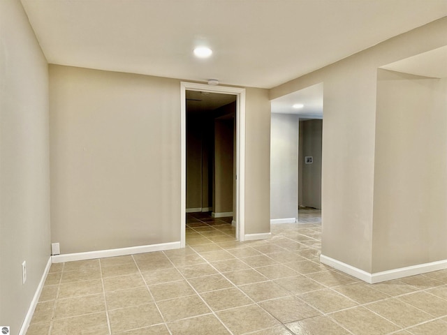 7160 Cherry Ave, Kewadin, MI 49648 - empty room with light tile patterned floors, recessed lighting, and a smoke detector