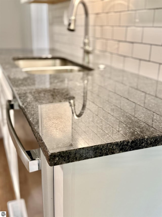 7160 Cherry Ave, Kewadin, MI 49648 - kitchen view of a sink and dishwasher