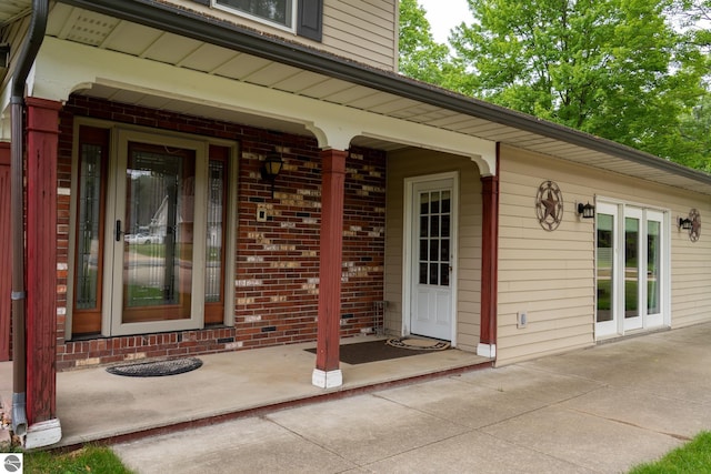 10200 S Lake Station Ave, Lake, MI 48632 - entrance to property with brick siding and a porch