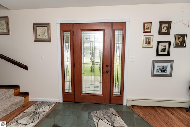 10200 S Lake Station Ave, Lake, MI 48632 - foyer entrance with a baseboard radiator and stairway