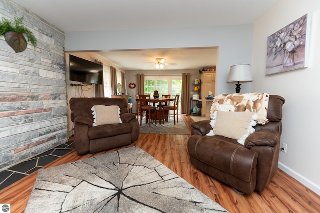 10200 S Lake Station Ave, Lake, MI 48632 - living room featuring wood finished floors and a ceiling fan