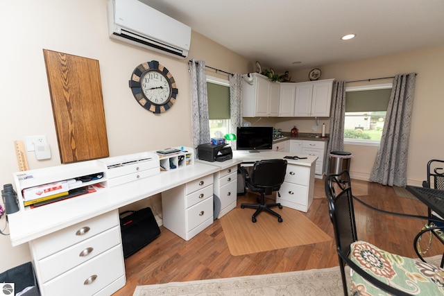 10200 S Lake Station Ave, Lake, MI 48632 - office space featuring a wall unit AC, light wood-style floors, and recessed lighting