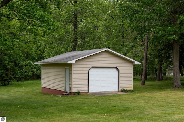 10200 S Lake Station Ave, Lake, MI 48632 - detached garage with a wooded view