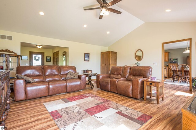 6375 S Isabella Rd, Shepherd, MI 48883 - living area featuring ceiling fan, lofted ceiling, light wood-style flooring, and recessed lighting