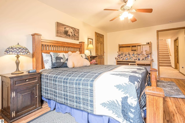6375 S Isabella Rd, Shepherd, MI 48883 - bedroom featuring wood finished floors and a ceiling fan