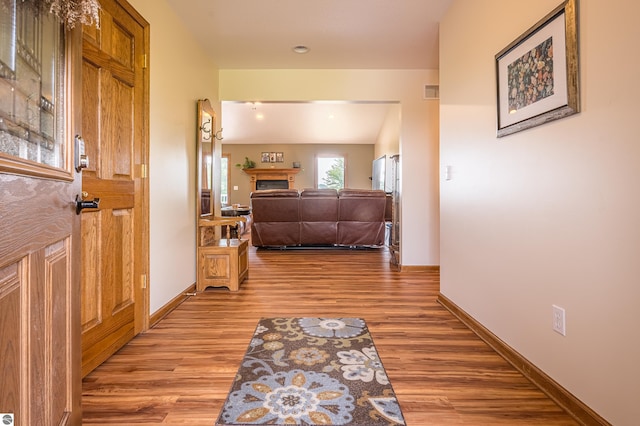 6375 S Isabella Rd, Shepherd, MI 48883 - hall with light wood-type flooring and baseboards