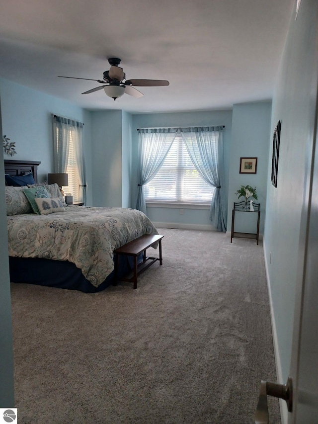 1379 Kunze Rd, East Tawas, MI 48730 - bedroom with carpet flooring and a ceiling fan