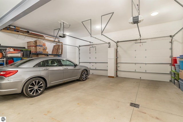 1379 Kunze Rd, East Tawas, MI 48730 - garage with a garage door opener