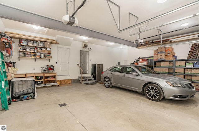 1379 Kunze Rd, East Tawas, MI 48730 - garage with a garage door opener
