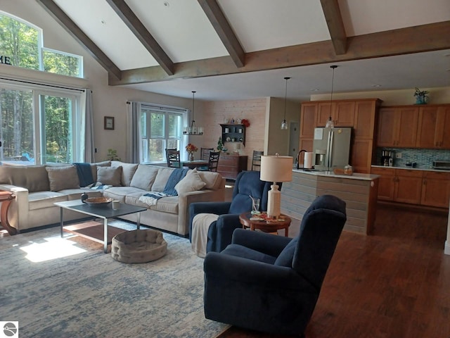 1379 Kunze Rd, East Tawas, MI 48730 - living room with dark wood-type flooring, beamed ceiling, and high vaulted ceiling