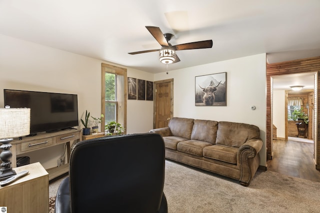 16933 3rd St, Copemish, MI 49625 - living room featuring a ceiling fan and carpet floors