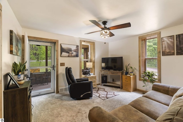 16933 3rd St, Copemish, MI 49625 - living area featuring plenty of natural light, light colored carpet, and ceiling fan