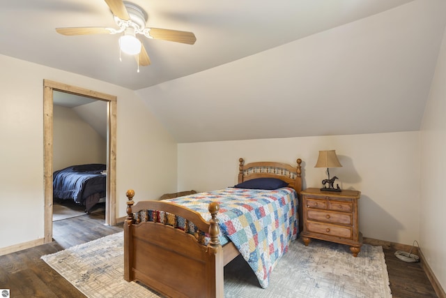16933 3rd St, Copemish, MI 49625 - bedroom featuring wood finished floors, vaulted ceiling, and a ceiling fan